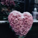pink roses arranged in heart shape